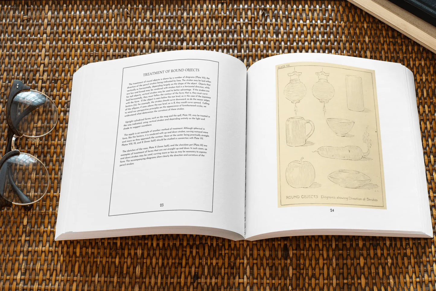 Open pages of the "Pencil Sketching" paperback book by Solar Spectrum Press showing detailed sketching tutorials and interior illustrations.