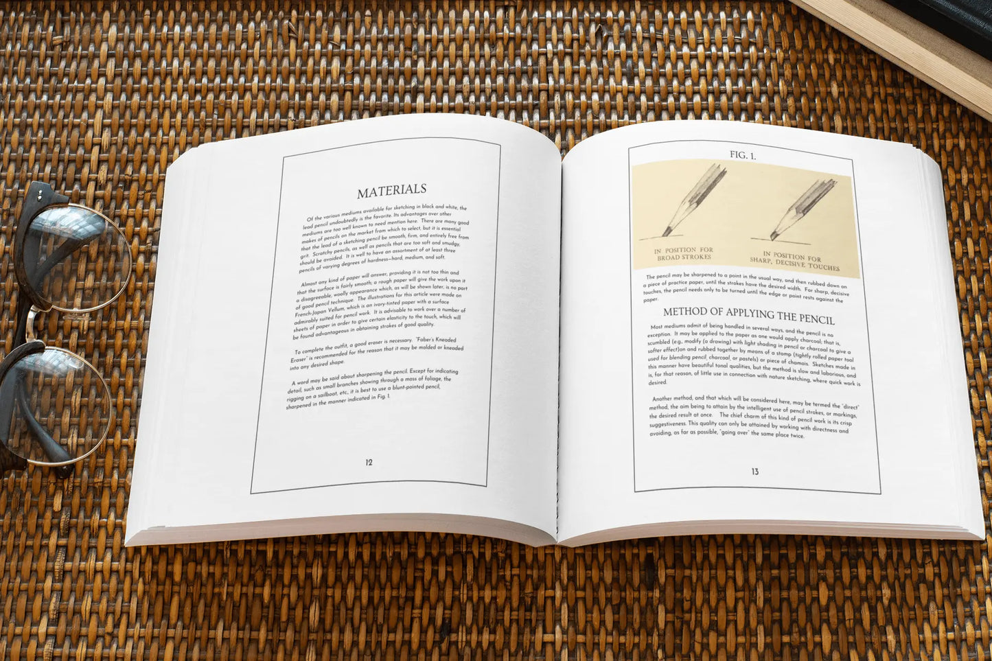Open paperback book titled "Pencil Sketching Revised" by Solar Spectrum Press showing detailed interior pages with sketching techniques.