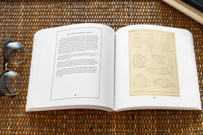 Open pages of the "Pencil Sketching" paperback book by Solar Spectrum Press showing detailed sketching tutorials and interior illustrations.